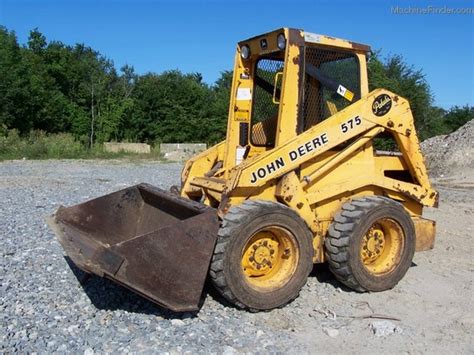 john deere 575 skid steer hydraulic pump|john deere skid steer pricing.